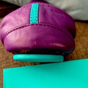 Ladies size 9 Tieks in purple. Really comfortable ballet flats.